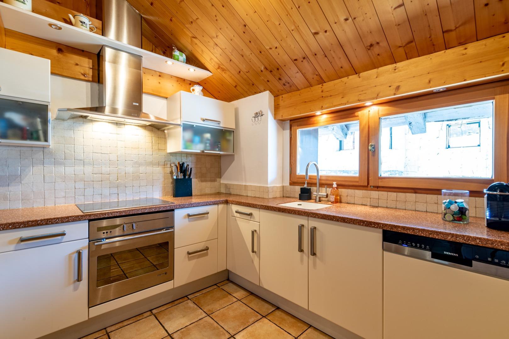 200m2 ski aux pieds avec grand parking