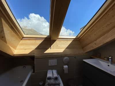 Penthouse avec terrasses au pied des pistes et remontées en centre station