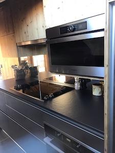 Penthouse avec terrasses au pied des pistes et remontées en centre station