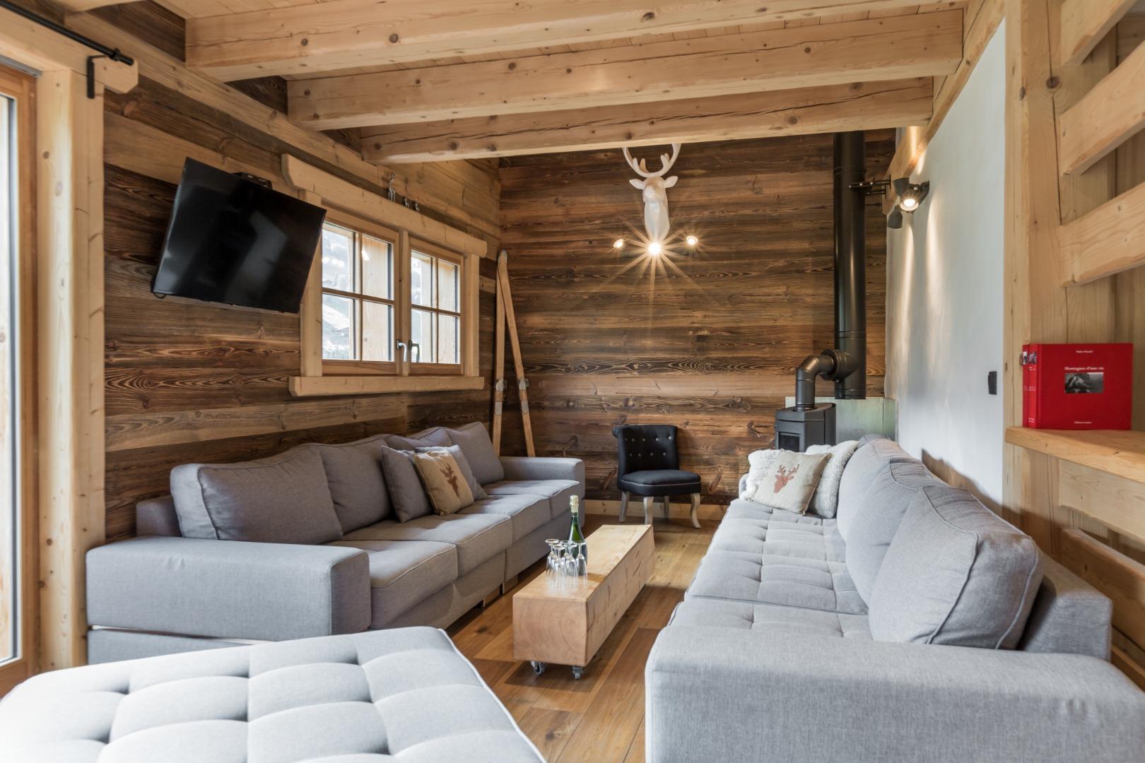 Chalet La Boule de Gomme avec SAUNA, Cheminée, luge devant le chalet VTT électriques