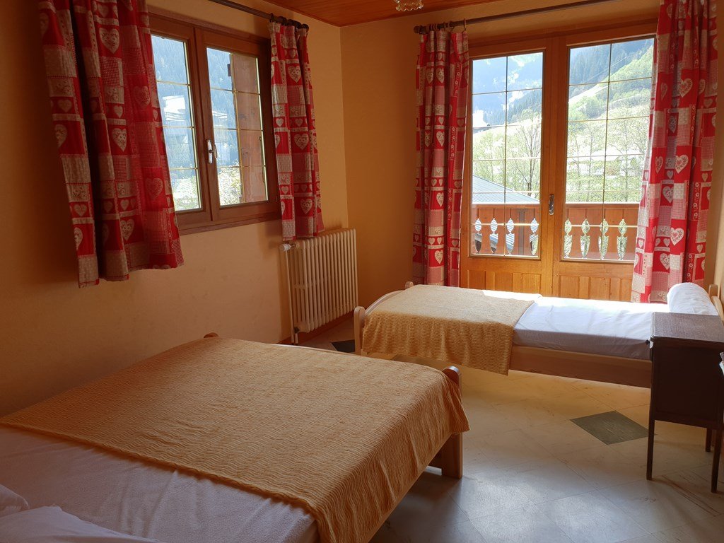 Chalet familial au départ des pistes du Planay pour 12 personnes, 4 chambres
