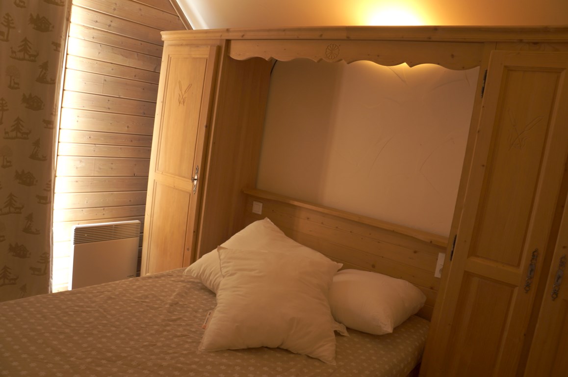 Location Chalet avec 4 chambres pour 12 personnes 