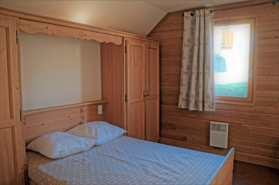 Location Chalet avec 4 chambres pour 12 personnes 